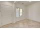 Bright, airy living room with tile flooring and a neutral color palette, ready for personal touches at 1055 Fish Pond Ave, Henderson, NV 89014