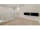 Second floor loft area with floating media center and staircase access at 1055 Fish Pond Ave, Henderson, NV 89014