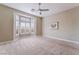 Bedroom with neutral walls featuring a bay window with shutter shades and carpet flooring at 10901 Fort Valley Ave, Las Vegas, NV 89134
