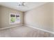 Bedroom featuring ceiling fan and window providing natural light at 10901 Fort Valley Ave, Las Vegas, NV 89134