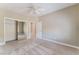 Bedroom featuring sliding door closet and ceiling fan at 10901 Fort Valley Ave, Las Vegas, NV 89134