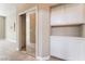 View of walk-in closet featuring mirrored door and built-in cabinets at 10901 Fort Valley Ave, Las Vegas, NV 89134