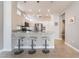 Eat-in kitchen offers white cabinetry and stainless steel appliances at 10901 Fort Valley Ave, Las Vegas, NV 89134