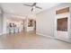 Open living area features ceramic tile flooring and access to outdoor patio at 10901 Fort Valley Ave, Las Vegas, NV 89134
