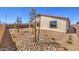 Desert landscaped backyard with minimal maintenance and block wall at 1220 Eva Creek Dr # 35, North Las Vegas, NV 89084