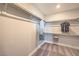 Walk-in closet with open shelving and ample storage space for organization at 1220 Eva Creek Dr # 35, North Las Vegas, NV 89084
