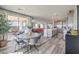 Open dining and kitchen area with patio access creates great entertaining space at 1220 Eva Creek Dr # 35, North Las Vegas, NV 89084