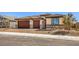 Beautiful single-story home with a two-car garage and a nicely landscaped front yard at 1220 Eva Creek Dr # 35, North Las Vegas, NV 89084