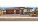 Beautiful single-story home with a two-car garage and a nicely landscaped front yard at 1220 Eva Creek Dr # 35, North Las Vegas, NV 89084