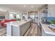 Bright, open kitchen with a large island perfect for entertaining and cooking at 1220 Eva Creek Dr # 35, North Las Vegas, NV 89084