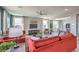 Bright and airy living room with comfortable seating, modern decor, and an open layout to dining room at 1220 Eva Creek Dr # 35, North Las Vegas, NV 89084