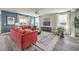 Bright and airy living room with comfortable seating, modern decor, and plenty of natural light at 1220 Eva Creek Dr # 35, North Las Vegas, NV 89084