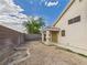 Expansive backyard awaiting your personal touch, partially fenced with a covered patio, perfect for outdoor gatherings at 1305 Pagentry Dr, North Las Vegas, NV 89031
