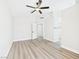 A bright bedroom with a ceiling fan at 1305 Pagentry Dr, North Las Vegas, NV 89031