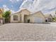 Charming single-story home featuring low maintenance desert landscaping at 1305 Pagentry Dr, North Las Vegas, NV 89031