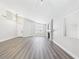 Bright living room with laminate floors, fireplace, vaulted ceiling and natural light at 1305 Pagentry Dr, North Las Vegas, NV 89031