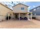 Spacious backyard featuring a covered patio area ideal for outdoor entertaining and relaxation at 1360 Angel Falls St, Las Vegas, NV 89142