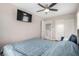 Serene bedroom featuring ceiling fan, twin bed, and wood floors at 1360 Angel Falls St, Las Vegas, NV 89142