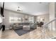 Spacious living room with wood floors, neutral paint, lots of light, and access to backyard at 1360 Angel Falls St, Las Vegas, NV 89142