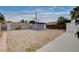 The backyard boasts a storage shed with a sandy area for potential gardening or landscaping projects at 1414 S 13Th St, Las Vegas, NV 89104