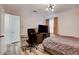 Inviting bedroom with wood-look flooring, modern fixtures, and a cozy ambiance, perfect for relaxation at 1414 S 13Th St, Las Vegas, NV 89104