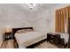 Relaxing bedroom featuring neutral tones, wooden flooring, and ambient lighting at 1414 S 13Th St, Las Vegas, NV 89104