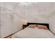 Serene bedroom offering wood-look flooring, cozy bedside lighting, and ample closet space at 1414 S 13Th St, Las Vegas, NV 89104