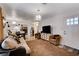 Cozy living room with an open layout, hardwood floors, comfortable seating, and a view to the kitchen at 1414 S 13Th St, Las Vegas, NV 89104