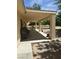 Covered back porch, perfect for outdoor living and relaxation, with views of the expansive yard at 1461 E Elderberry St, Pahrump, NV 89048