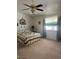 Cozy bedroom with a window view, decorated with a comfortable bed and decorative wall art at 1461 E Elderberry St, Pahrump, NV 89048