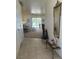 Inviting entryway with tile flooring and a view into the spacious living area at 1461 E Elderberry St, Pahrump, NV 89048