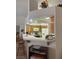 An open concept kitchen overlooks a breakfast bar and has modern appliances at 1461 E Elderberry St, Pahrump, NV 89048