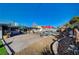 Backyard features mature trees, lush landscaping, pool, patio and outdoor furniture at 1631 Ottawa Dr, Las Vegas, NV 89169
