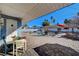 Inviting in-ground pool surrounded by a brick patio with seating at 1631 Ottawa Dr, Las Vegas, NV 89169