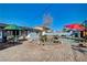 Backyard featuring a pool with an umbrella-covered table and chairs at 1631 Ottawa Dr, Las Vegas, NV 89169