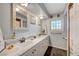 Charming bathroom with dual sinks, marble countertops, and tiled shower at 1631 Ottawa Dr, Las Vegas, NV 89169