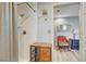 Bathroom featuring a shower with a glass door, wood cabinet and tile flooring at 1631 Ottawa Dr, Las Vegas, NV 89169