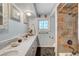 Charming bathroom with dual sinks, marble countertops, and tiled shower at 1631 Ottawa Dr, Las Vegas, NV 89169