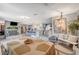 Open-concept dining area with tile floors and access to a kitchen and a living room at 1631 Ottawa Dr, Las Vegas, NV 89169