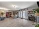Open dining area leading to an entertainment area and patio via glass doors at 1631 Ottawa Dr, Las Vegas, NV 89169