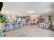 Bright dining area with a breakfast bar, open to the kitchen and featuring tile floors at 1631 Ottawa Dr, Las Vegas, NV 89169