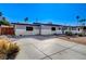 Charming single-story home featuring a well-maintained front yard and a spacious driveway at 1631 Ottawa Dr, Las Vegas, NV 89169