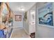 Hallway with unique decorative elements, tile flooring, and access to a bathroom at 1631 Ottawa Dr, Las Vegas, NV 89169