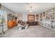 Open living room featuring built-in shelving, modern decor, and neutral paint colors at 1631 Ottawa Dr, Las Vegas, NV 89169