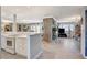 Spacious living room featuring an open floor plan and exposed stone fireplace at 1631 Ottawa Dr, Las Vegas, NV 89169