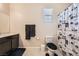 Cozy bathroom with shower and unique designed shower curtain at 1641 Blue Cliffs Ave, Henderson, NV 89014