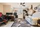 Office/Den with dark-toned floors, bright walls, and a large window for lots of natural light at 1641 Blue Cliffs Ave, Henderson, NV 89014