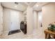 Bright foyer featuring tile flooring, neutral paint, and direct access to living spaces at 1641 Blue Cliffs Ave, Henderson, NV 89014