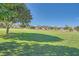 Expansive, well-maintained green field provides an open space perfect for picnics, recreation, and community activities at 1641 Blue Cliffs Ave, Henderson, NV 89014