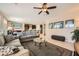 Open-concept living area seamlessly connected to the kitchen and dining spaces at 1641 Blue Cliffs Ave, Henderson, NV 89014